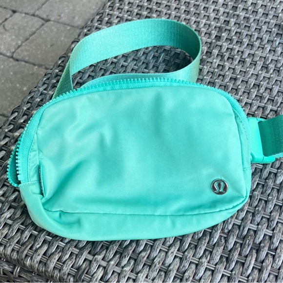 lululemon athletica Handbags - Lululemon Turquoise 1L Everywhere Belt Bag